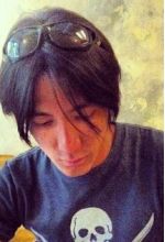 Taku Komaya