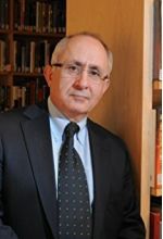 Танер Акчам