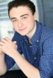 Adam M. Brett